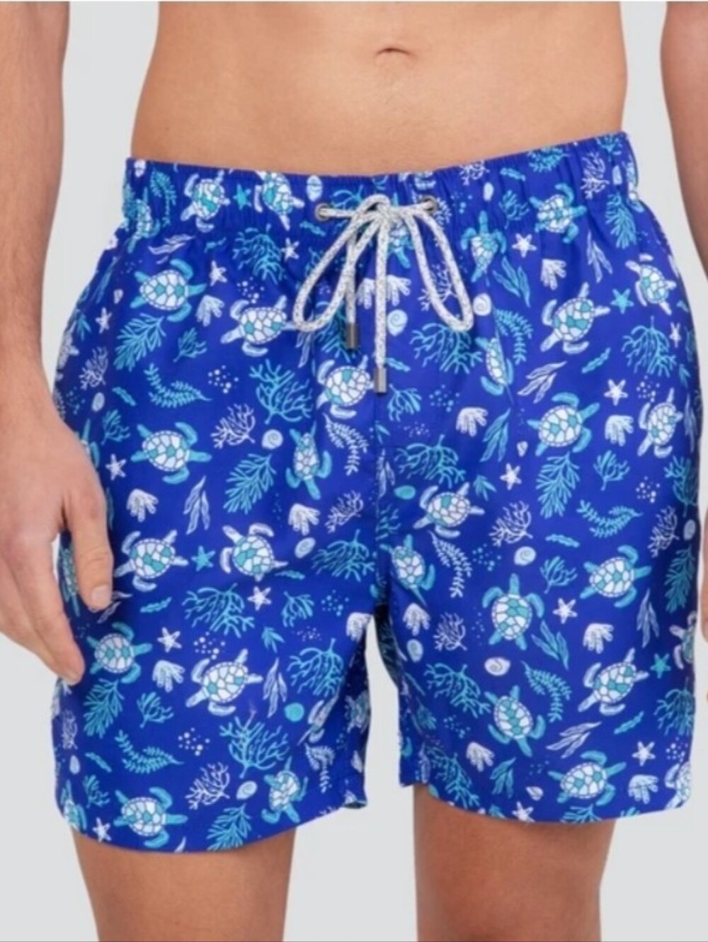 surf style Blue Floral Swim Shorts with Light Blue Rash Guard.
